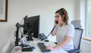 Staff speaking with a patient on the phone