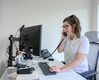 Staff speaking with a patient on the phone