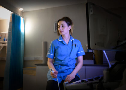 A nurse preparing for an ultrasound scan