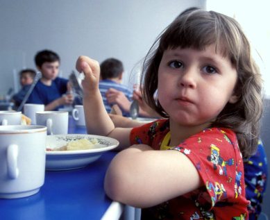 Child eating at table