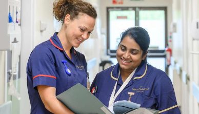 Nurses reviewing patient notes