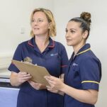 Nurses reviewing patient information