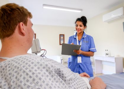 nurse talking to patient